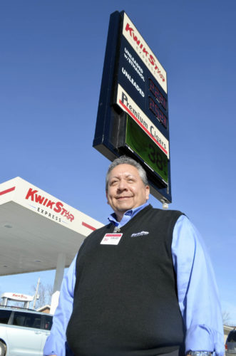 -Messenger photo by Joe Sutter David Munoz is store leader at the Fort Dodge Kwik Star Express, which opened this month and had its grand opening on Wednesday. The store offers specialty coffee, its own line of meat, milk and other grocery products, and a walk-in humador of premium cigars.